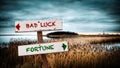 Street Sign Fortune versus Bad Luck Royalty Free Stock Photo