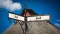 Street Sign Good versus Bad Royalty Free Stock Photo