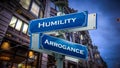 Street Sign Humility versus Arrogance Royalty Free Stock Photo