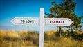 Street Sign LOVE versus TO HATE Royalty Free Stock Photo