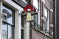 Street sign of a mushroom in the streets of Amsterdam, as a sign that you can buy magic mushrooms as a drug Royalty Free Stock Photo