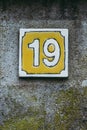 Street sign with number nineteen
