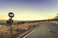 Street sign showing the direction during the sunset Royalty Free Stock Photo