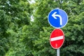 Street sign showing wrong direction and having to turn left