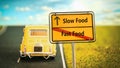 Street Sign Slow versus Fast Food Royalty Free Stock Photo