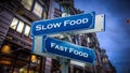 Street Sign Slow versus Fast Food Royalty Free Stock Photo