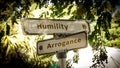 Street Sign to Humility versus Arrogance Royalty Free Stock Photo
