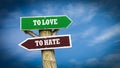 Street Sign TO LOVE versus TO HATE Royalty Free Stock Photo