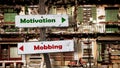 Street Sign to Motivation versus Mobbing