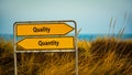 Street Sign to Quality versus Quantity Royalty Free Stock Photo