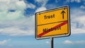 Street sign to trust versus mistrust