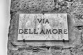 Street sign for Via dell`Amore, picturesque street in Pienza, Italy