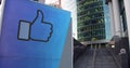 Street signage board with Facebook like button thumb up