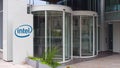 Street signage board with Intel Corporation logo. Modern office building. Editorial 3D rendering