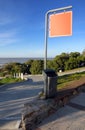 Street with signage to the beach