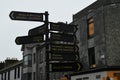 Street signs in english and gaelic on the streets of Galway, Ireland Royalty Free Stock Photo