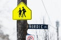 Student crossing nordic place sign Royalty Free Stock Photo