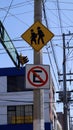 Street signs in mexico, pedestrian cross and no parking disk