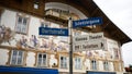 Street Signs in Oberammergau Germany and Luftlmalerei Painted Building