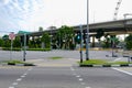 Street in Singapore Clean, orderly There is a clear traffic symbol on the road.