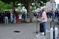 Street singer is performing at the Jubilee garden, London