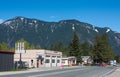 Street of small canadian town on snow mountain and blue sky background