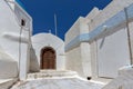 Street and small church In the castle of Pyrgos Kallistis, Santorini island, Thira, Greece