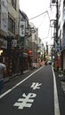 Street with small shops in suburban Tokyo Royalty Free Stock Photo