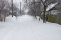 Street of a small Ukrainian village at winter season