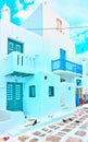 Street with small whitewashed houses in Mykonos