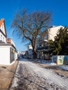 Street with snow in wintertime in Warnemuende, Germany