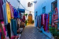 Street souvenyrs market in ancient white medina of the Asilah Village, Morocco