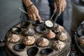 Street stone barbecue with grilled eggs in Vietnam