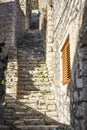 Street with stone stairs leading to the hill in Skradin town, Croatia Royalty Free Stock Photo