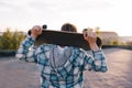 Street subculture. Skateboarder with skateboard Royalty Free Stock Photo