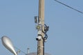 Street surveillance camera mounted on a pole with LED spotlights