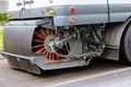 Street Sweeper car is cleaning machine in the municipal car for cleaning brush roads sidewalks outdoors Royalty Free Stock Photo