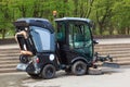 Street sweeper used for street cleaning services. The car vacuumed on the street. Royalty Free Stock Photo