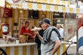 Street tent selling fried sausage. Small business at the city fair.