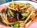 On the street Thai green papaya salad, Som Tum, Bangkok, capital of street food, Thailand. Normally paired with sticky rice