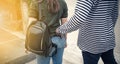 Street thief stealing mobile phone from back pocket of jeans woman, Robber, Thief concept Royalty Free Stock Photo