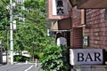 Street in Tokyo with a couple of small redbrick restaurants