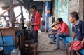 Street trader sells fast food for hungry people on the busy street in Kolkata