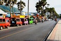 Street trading, tuk-tuk and rent scooters on the srteet in Phuket.