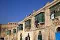 Street with traditional Balconies in historical Center of Valletta. Malta Royalty Free Stock Photo