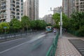 Street traffic and modern buildings in Putuo district. Residential skyscrapers in Shanghai, China Royalty Free Stock Photo