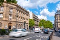 Street Traffic of Paris on a Sunny Summer Day