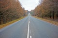 Street, trees and clouds in sky with overcast weather for trip, journey or travel on highway in fall. Environment