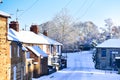 Street with two-storey houses, all in the snow. Royalty Free Stock Photo