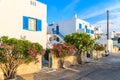 Street with typical Greek houses in Naoussa village on Paros island, Greece Royalty Free Stock Photo